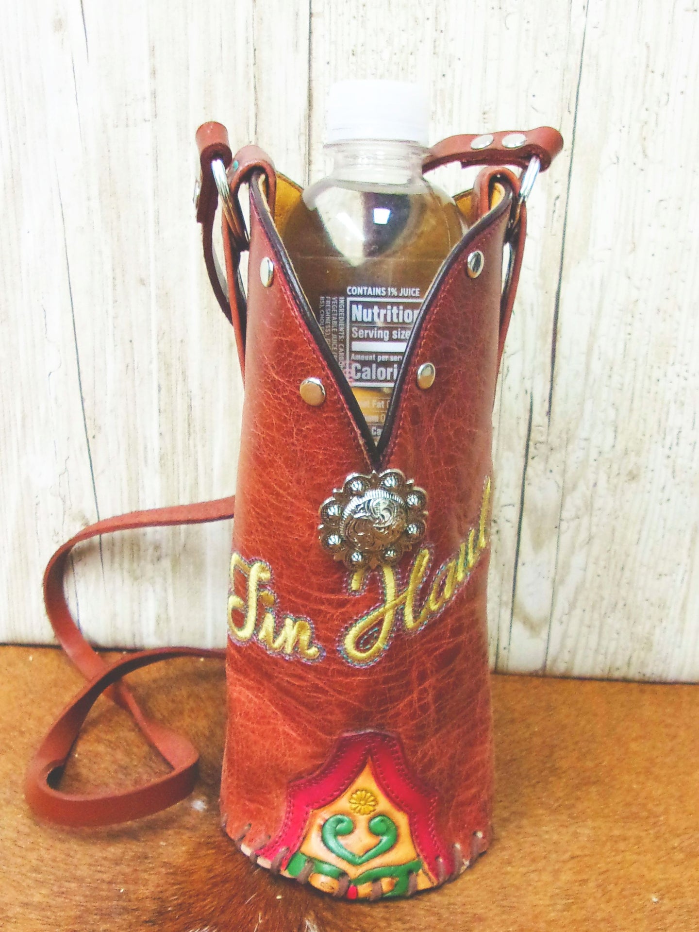 Cowboy Boot Wine Water Tote WA39 handcrafted from cowboy boots. Shop Wine Carrier Bags at ChrisThompsonBags.com and buy the best cowgirl wine tote, leather wine carrier, Leather Wine tote, recycled cowboy boots, unique gift for her, unique gift for him, water bottle caddy, water bottle holder, water bottle tote, western wine carrier, western wine tote, wine lovers gift, Wine Tote at Chris Thompson Bags.